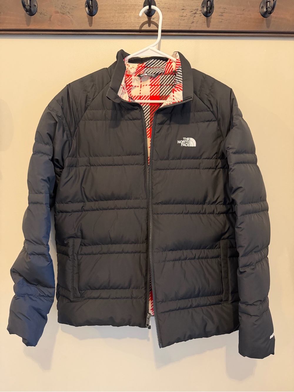 The North Face Black Youth XXL Insulated Puffer Jacket with Red Plaid Lining